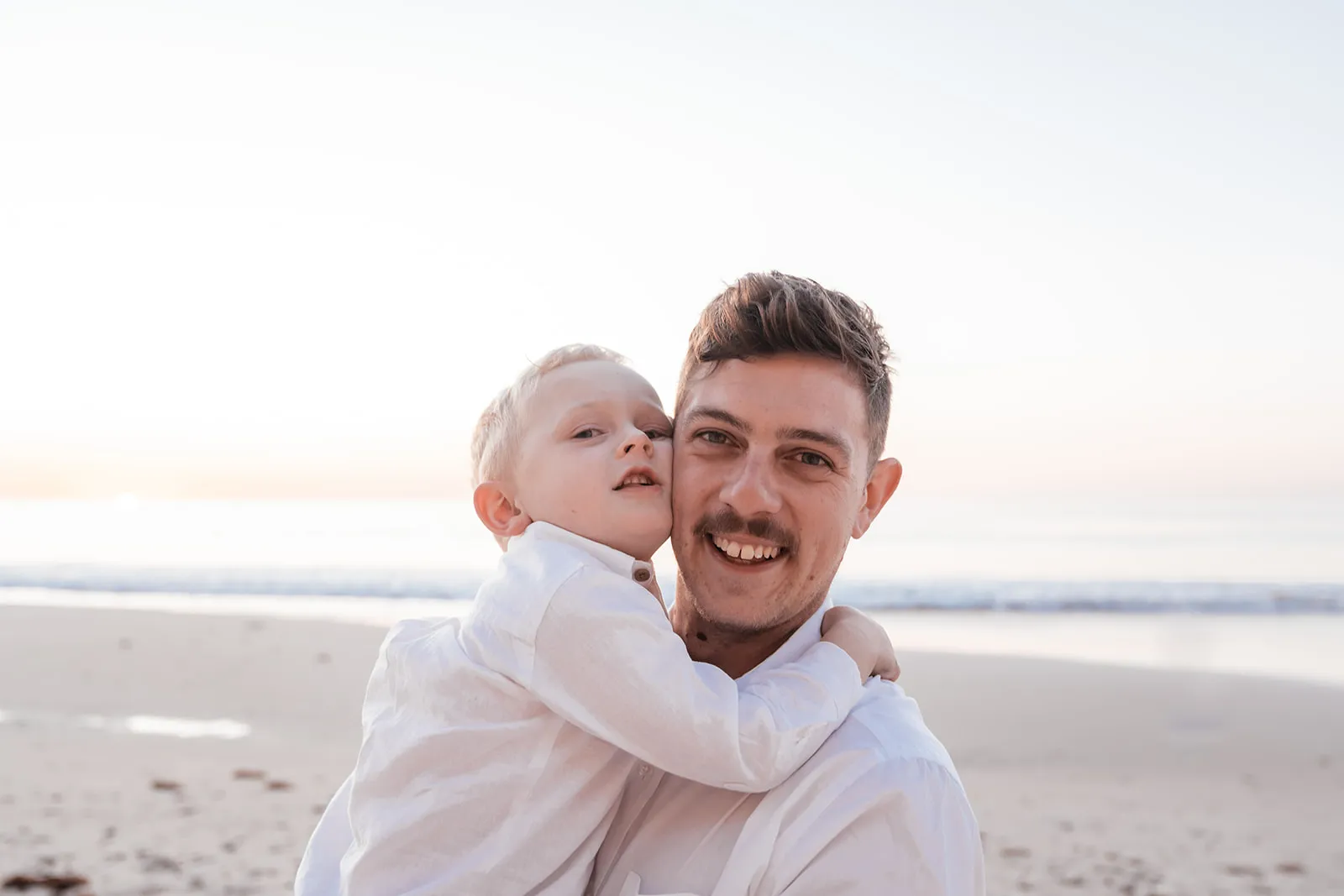 Joyful father and son portrait