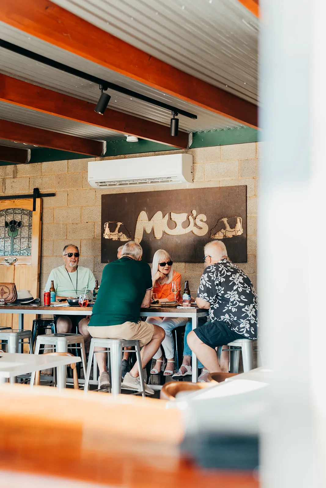 Branded interior with guests enjoying the venue