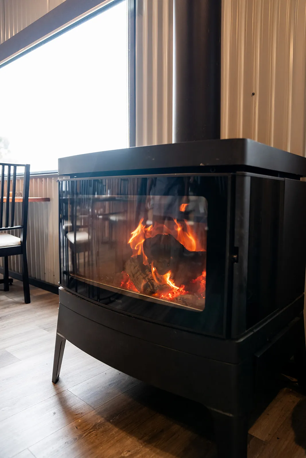 Warm fireplace interior at the venue