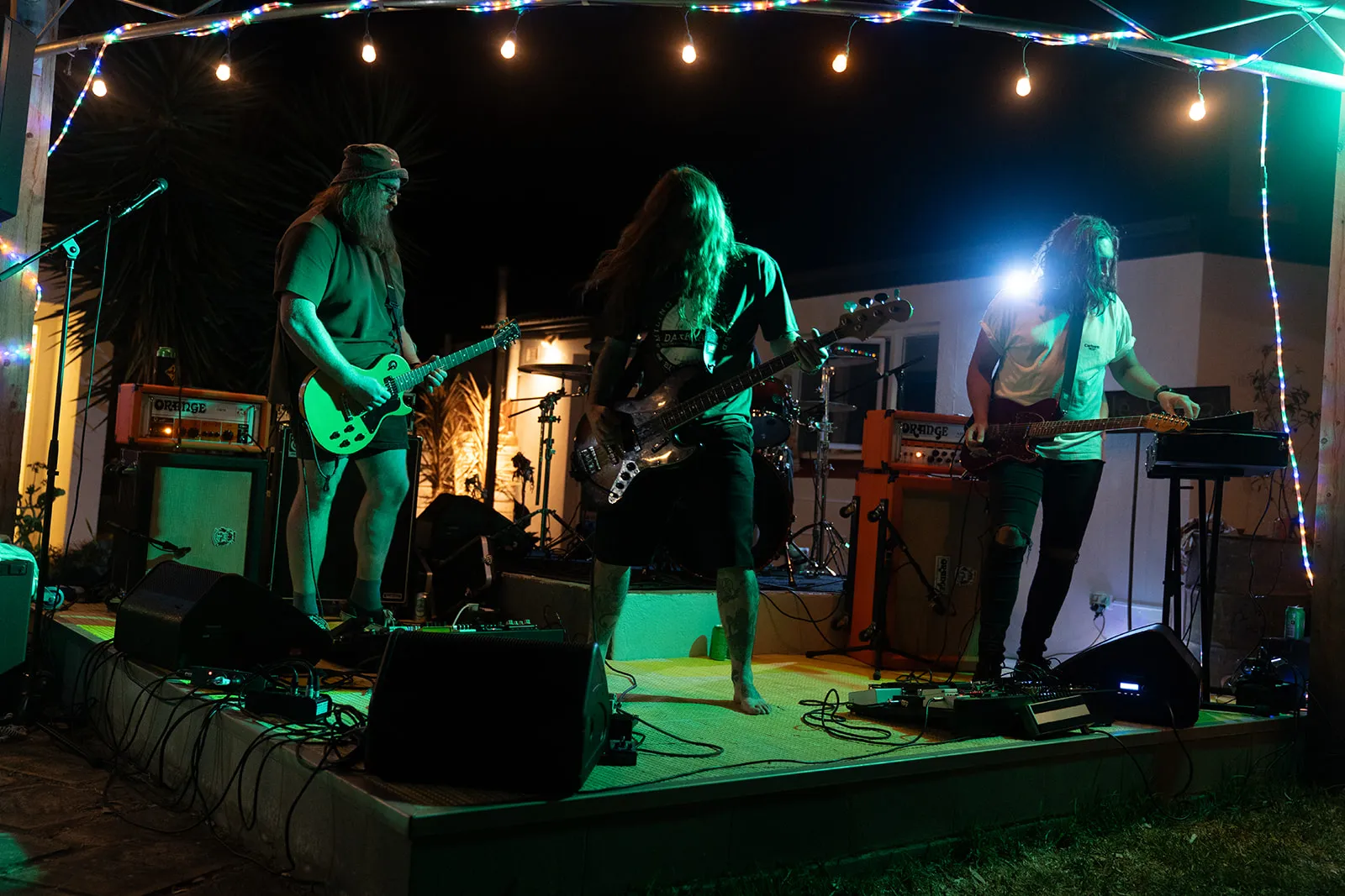 Band performing together on stage